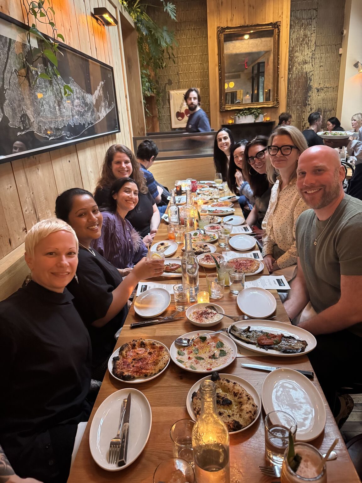 Brand leaders around a long table at a Storm King dinner