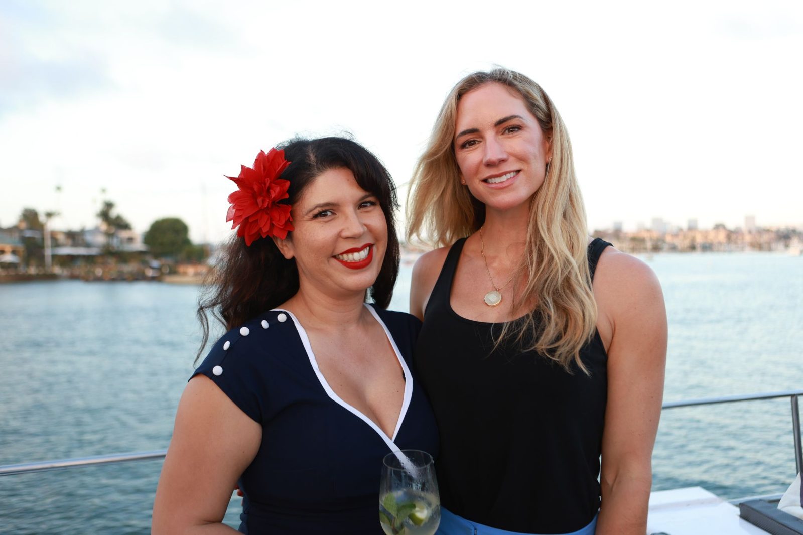 Two members on the Retail Club sunset cruise in Newport Beach